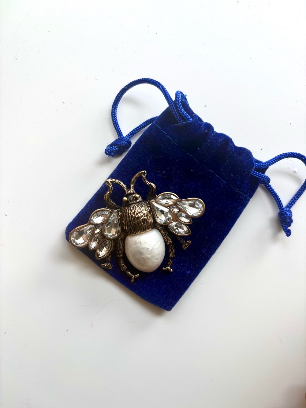 Gold-Tone Bee Brooch with Pearl and Clear Crystal Wings in Blue Pouch